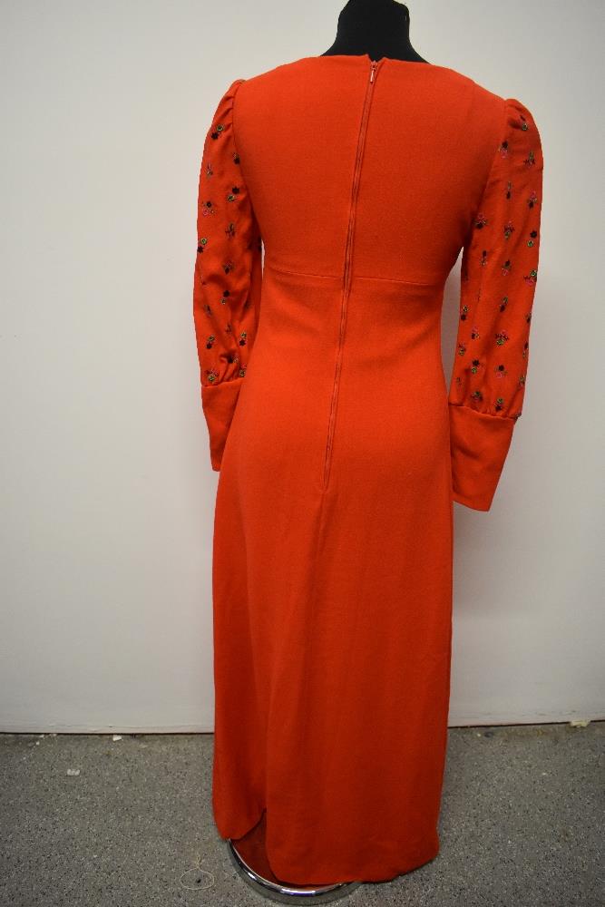 A striking 1960s cherry red maxi dress of wool crepe type fabric, having embroidery to bust and - Image 6 of 8