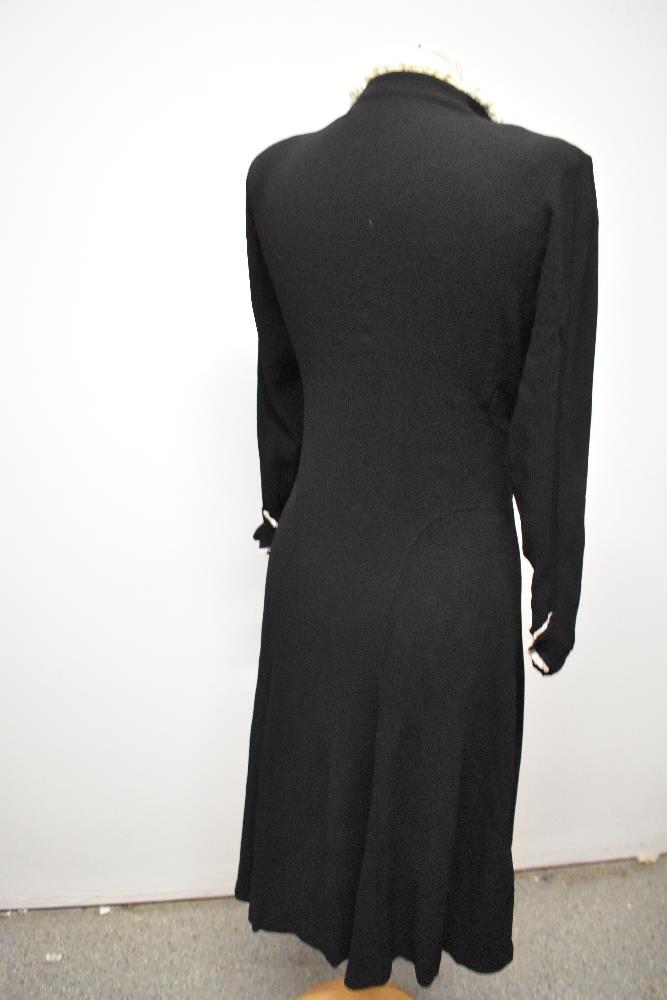 A late 1930s/40s day dress in black seersuker crepe cut on the bias, giving a lovely clingy fit, - Image 6 of 9