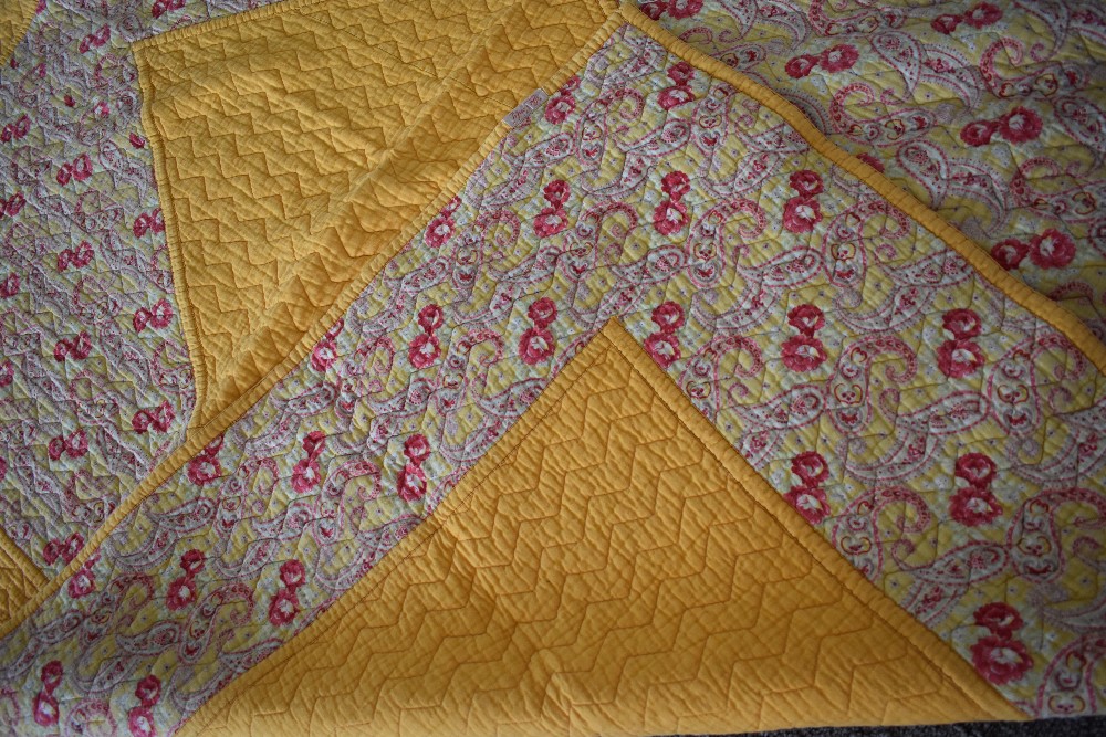 A 1930s/40s 'The Comfy' quilt, having paisley diamond to centre with block yellow surround and - Image 4 of 5