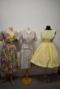 Two 1950s cotton sundresses, one having floral pattern (a few buttons missing, otherwise good) and