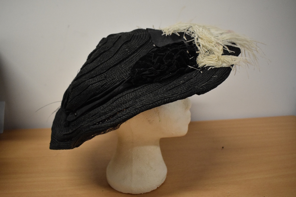 An Edwardian black straw hat, having feathers and velvet trim to brim and two hat pins. - Image 3 of 7