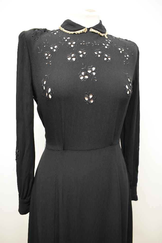 An unusual 1930s/40s day dress of black crepe with floral cut work to bodice and sleeves, lace - Image 2 of 10