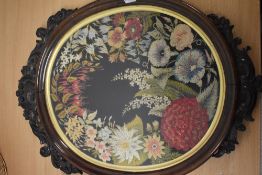 A framed and glazed Victorian panel, depicting finely detailed sprays of flowers.