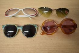 Four pairs of vintage sunglasses, including late 1950s/60s with original sticker still in places and