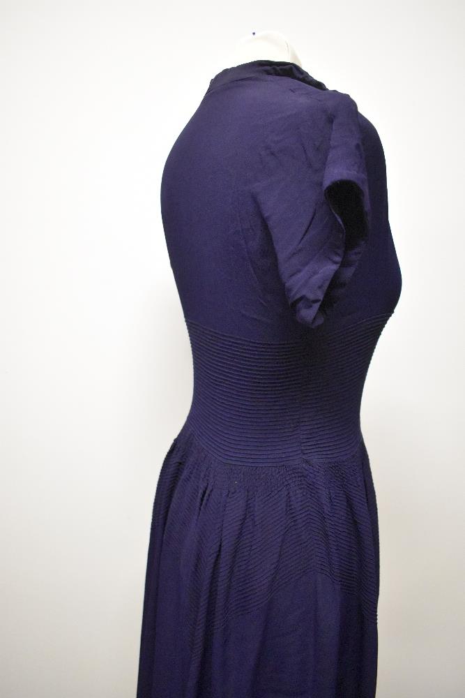 A striking 1940s navy blue floppy crepe day dress, having pointed cross over collar and tiny ribs of - Image 7 of 12