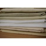 An assorted lot of pieces of vintage medium and light weight linen.