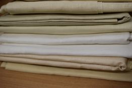 An assorted lot of pieces of vintage medium and light weight linen.