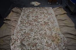 An antique Crewel work bed covering with valanced edge and a bright Crewel work table runner.