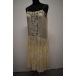 A beautiful 1920s fine cream silk and lace petticoat, small to medium size.