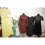 A mixed lot of vintage dresses, including 1960s dress with sheer full length sleeves, beading and