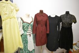 A mixed lot of vintage dresses, including 1960s dress with sheer full length sleeves, beading and