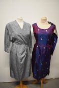 A late 1940s/ early 50s slate grey day dress with half belt to back and floral sprigs throughout,