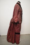 A two piece Victorian silk and velvet outfit in burgundy with rose pink stripe, alternations to