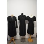 Three 1960s black wiggle dresses, including lace dress with bow detail to bust, medium to larger