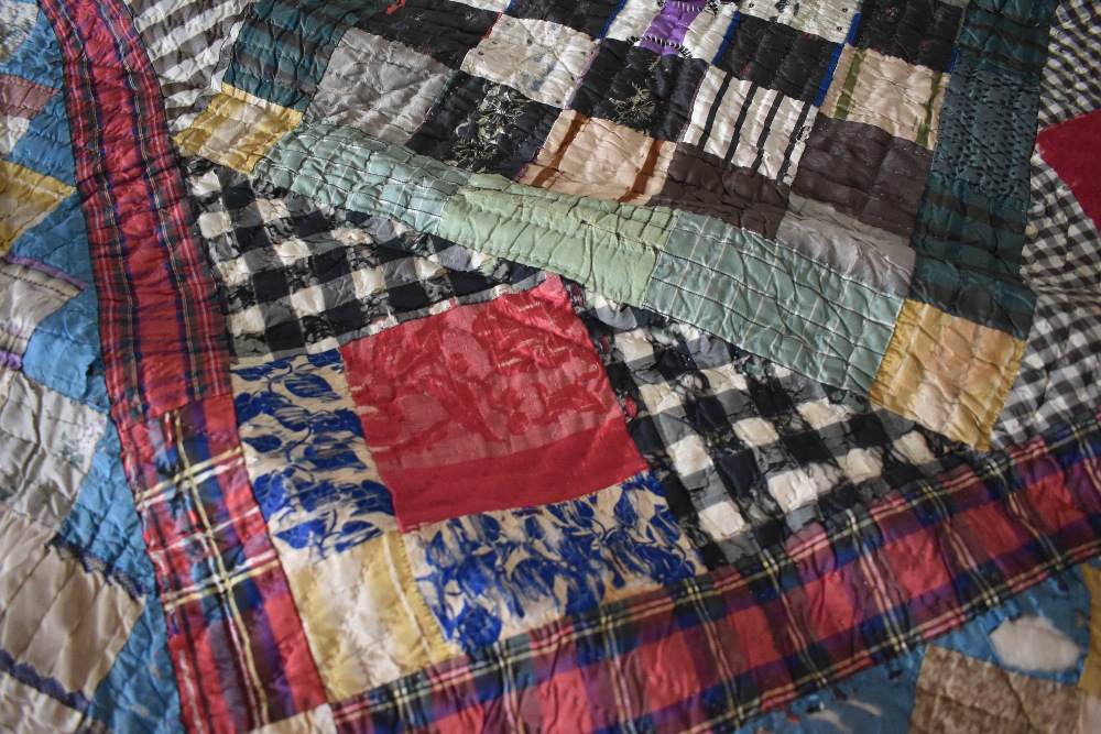 A Victorian silk quilt, having chevron cotton reverse in coffee coloured cotton, edges are - Image 3 of 7
