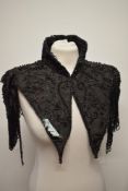 A heavily beaded Victorian capelet, AF.