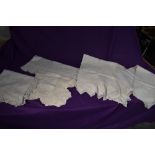 Five antique white work table cloths, all having intricate embroidery, crochet and other