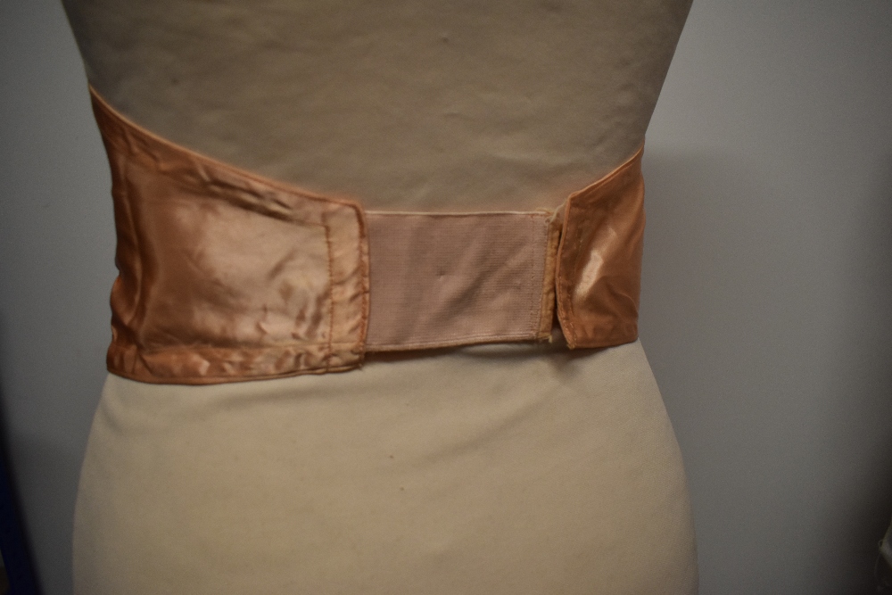 A 1940s strapless pink satin finish bra and a 1920s bralette with shirred back. - Image 7 of 10