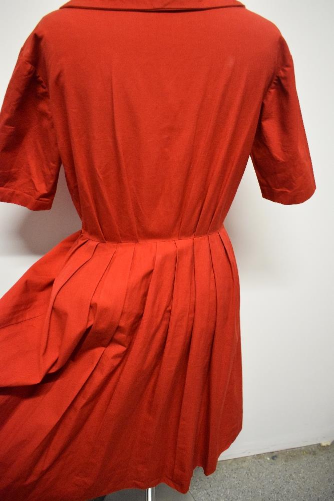 A 1950s medium weight cotton cherry red day dress, having large statement buttons, ties to neck, - Image 5 of 7