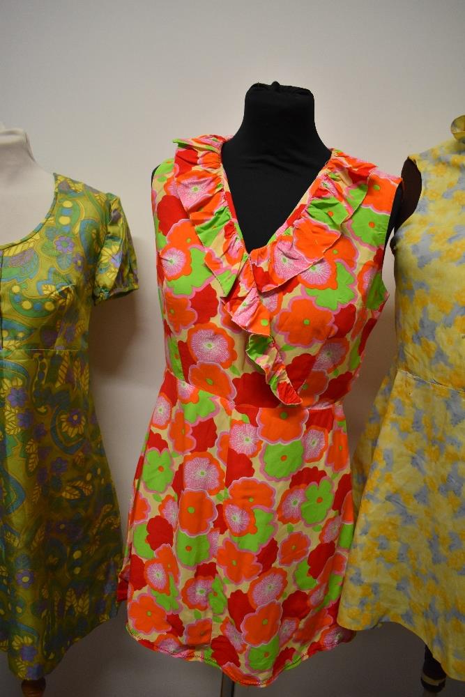 Three vintage 1960s brightly patterned mini dresses. - Image 3 of 10