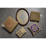 A selection of vintage Ruskin lace bookmarks and pin cushions etc.