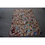 A patchwork quilt made up of Victorian and later material approx 213cm x 145cm. Halls, Much