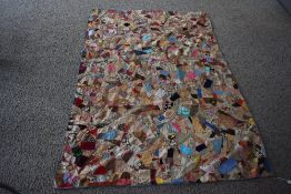 A patchwork quilt made up of Victorian and later material approx 213cm x 145cm. Halls, Much