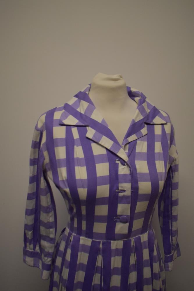 A late 1950s/ early 1960s cotton day dress having bold purple checked pattern, side metal zip, 3/4 - Image 2 of 5