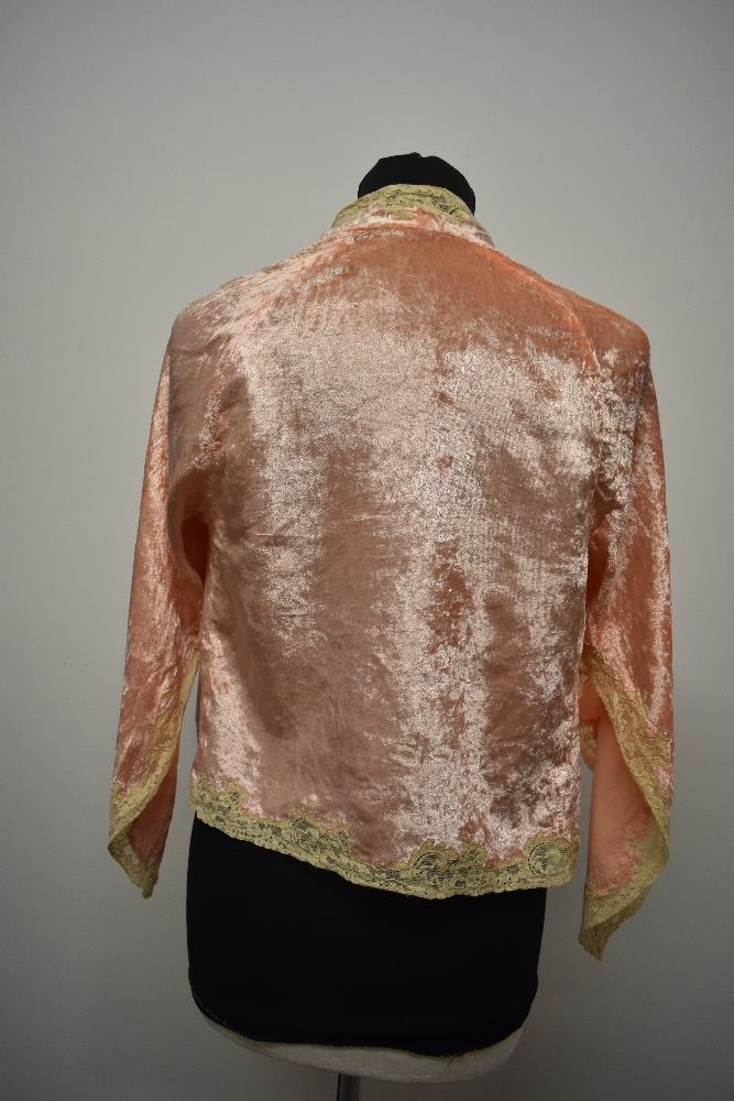 A decadent 1930s Art Deco bed jacket of pale pink velvet, having extensive lace edging, pointed - Image 4 of 7