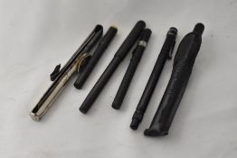 Five fountain pens including three dipping pens an eyedropper and a Stylo with three Swan pocket