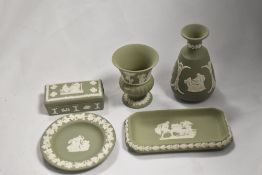 A small group of green jasperware, to include two vases, two trinket dishes, and a lidded dish