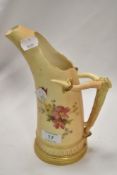 A Royal Worcester tusk jug, on blush ivory ground, with floral design, stamped '1116' to the base,