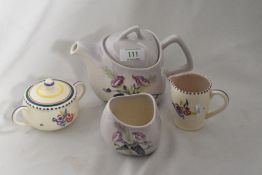 A Carleton ware Australian design teapot and sugar basin, sold with a Poole Pottery handled sugar