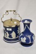 A Wedgwood blue jasperware biscuit barrel with silver plated lid and handle together with a baluster