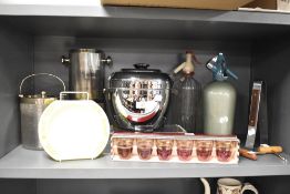 A shelf of mid-20th Century items, to include two soda siphons, one by Marsh's of Barrow, a 1950s