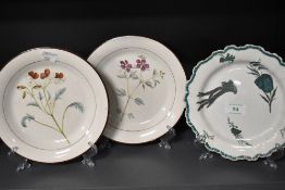 A 19th Century creamware and feather edged plate, plus two other 19th century porcelain plates