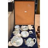 An early 20th century cased Chinese/Japanese porcelain tea set decorated with birds and blossoms