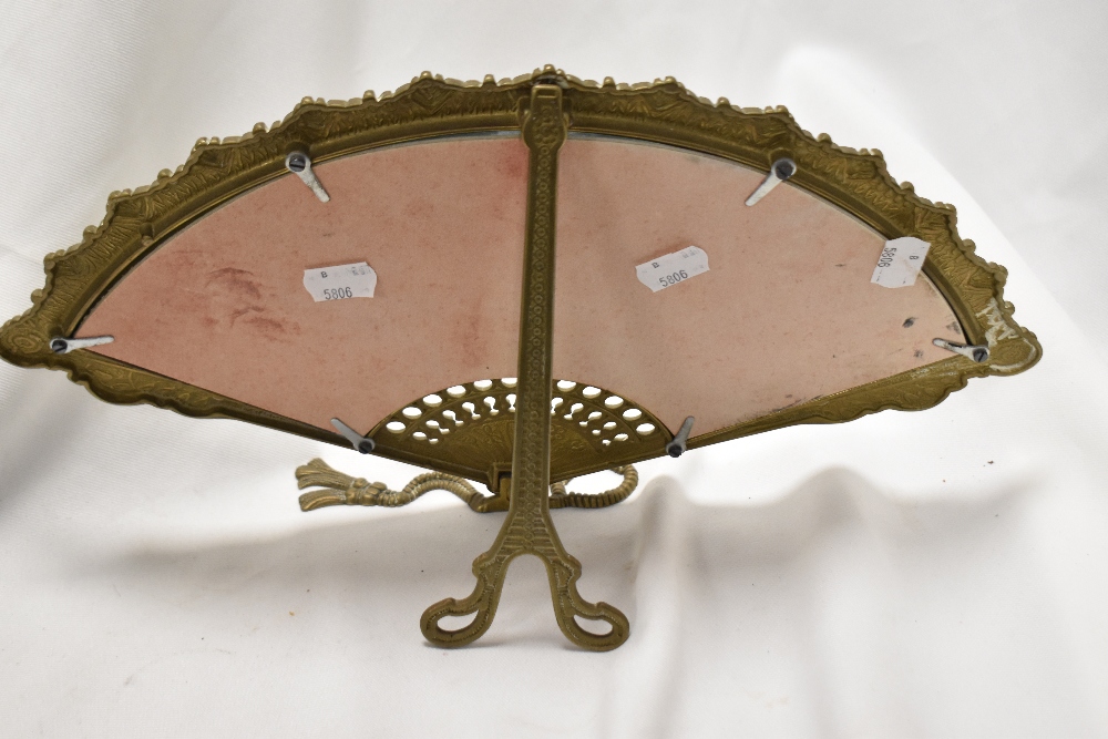 A cast-brass dressing table mirror, modelled as an opened fan, with easel type stand to reverse - Image 2 of 2