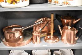 An assorted collection of 19th Century copperware, to include an Art Nouveau crumb tray and brush, a
