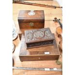 Five early 20th century wooden boxes, including inlaid and carved examples