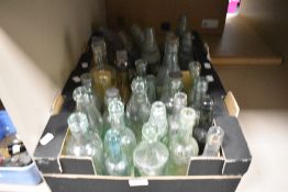 A large collection of glass advertising bottles, of Slough, Blackpool, Blackburn interest etc.