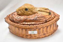 A French trompe l'oeil porcelain lidded soup terrine, in the form of a hare, measuring 16cm tall and
