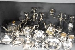A quantity of silver plated ware, to include candelabras, teapots, pepperettes, and candlesticks