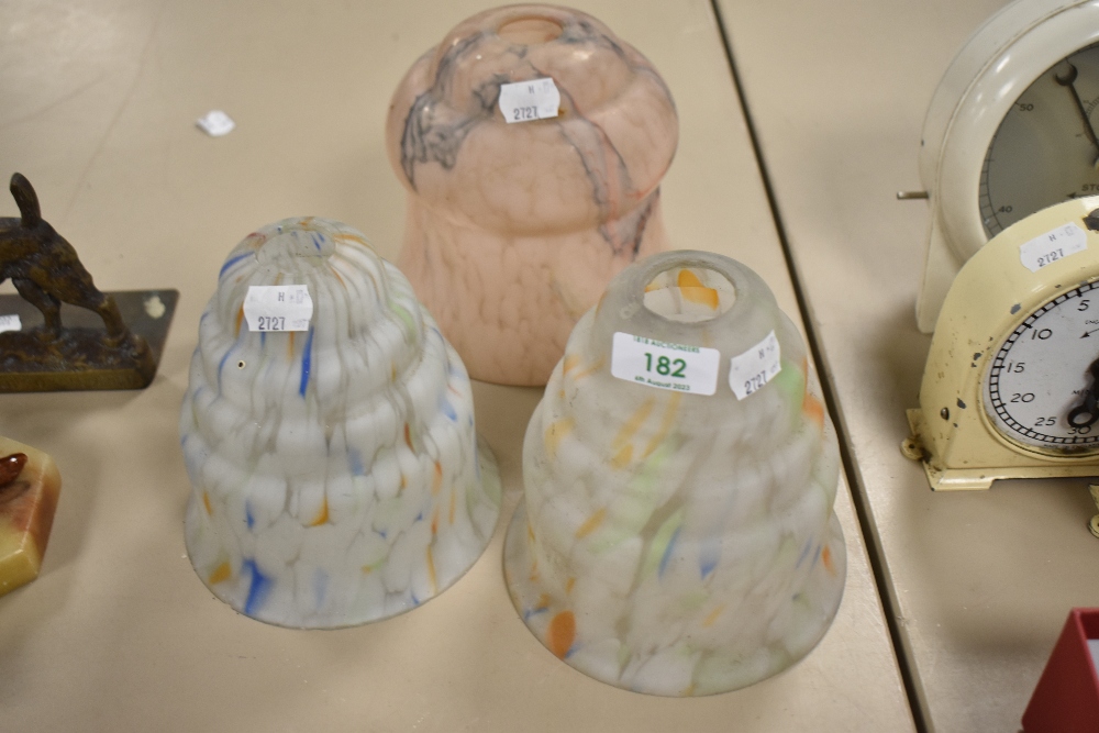 A group of three vintage mottled glass light shades