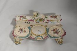 A 19th century Derby style porcelain ink stand, having lamb with floral relief wreath around neck to