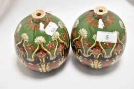 A pair of bulbous Royal Bonn 'Old Dutch' pottery vases, measuring 12cm tall