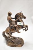 A John Beswick 'The Britannia Collection' patinated horse and jockey ornament, the base with