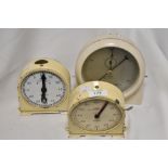 A Griffin & George Limited white bakelite stop clock, sold along with two Smiths timer clocks