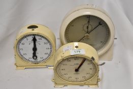 A Griffin & George Limited white bakelite stop clock, sold along with two Smiths timer clocks
