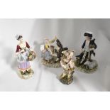 Four 20th century classically styled figurines, including one having crossed sword mark to